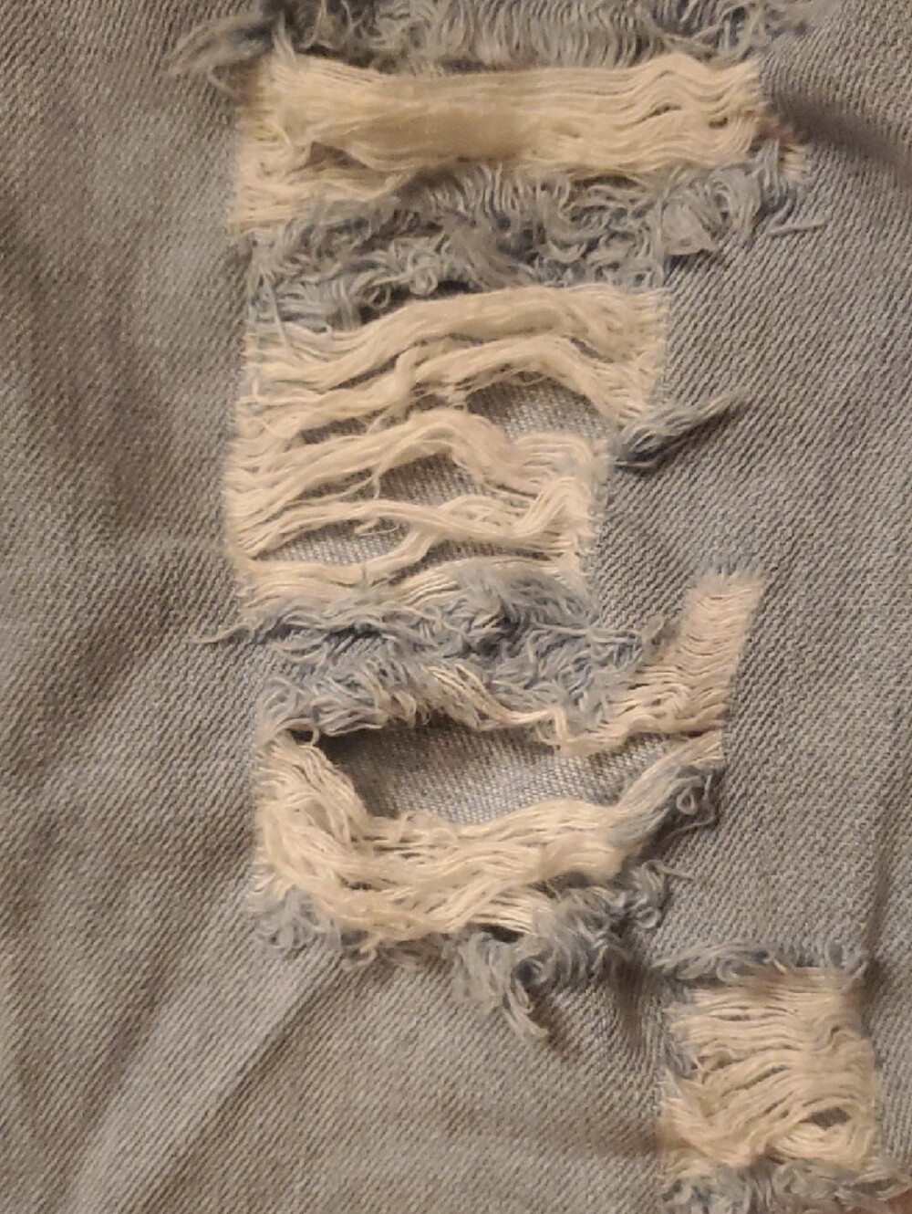 Light Wash Distressed Ripped Jeans - Picture 4 of 9